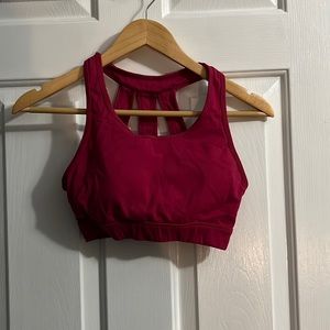 NVGTN size small berry red sports bra caged backing